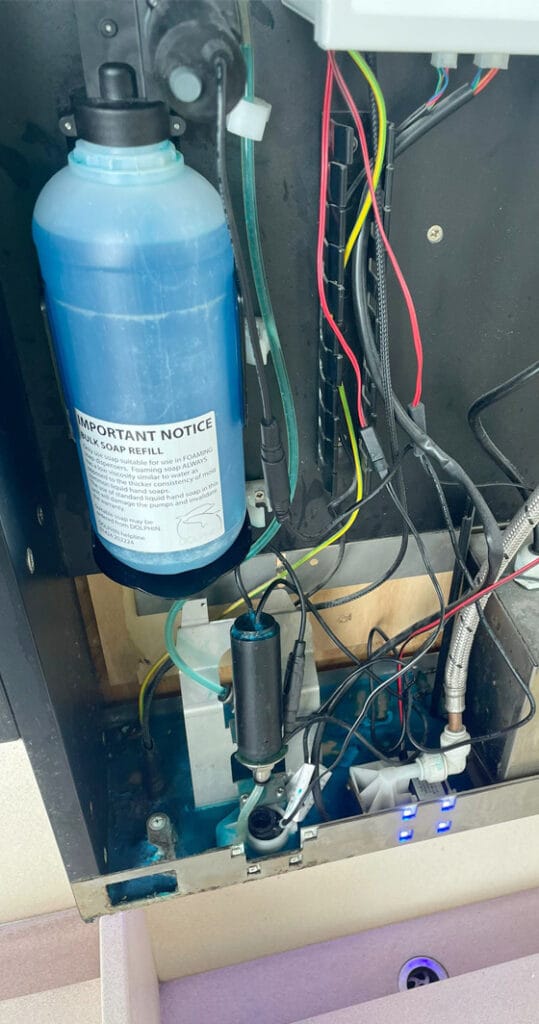 Failed bulk fill dispenser discharging runny liquid