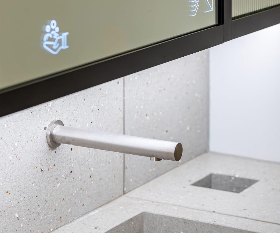 Sensor activated touch-free tap integrated with hygiene flush feature