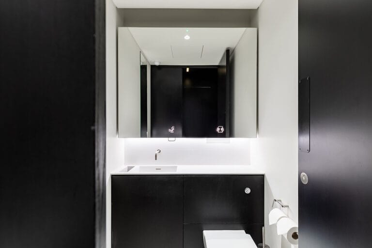 Alavo Superloo black and white themed commercial washroom