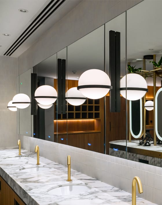 SMART commercial washroom technology with touch-free sensor taps and Dolphin Alavo