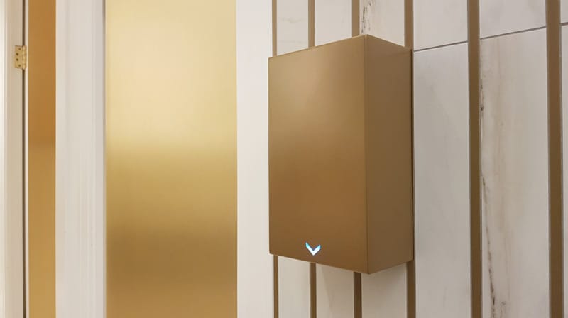 Special finish and eco-friendly coating for a hand dryer in fired gold colour