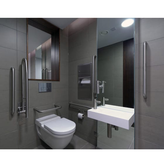 A mirror installed above the hand rinse basin, with second mirror above WC pan