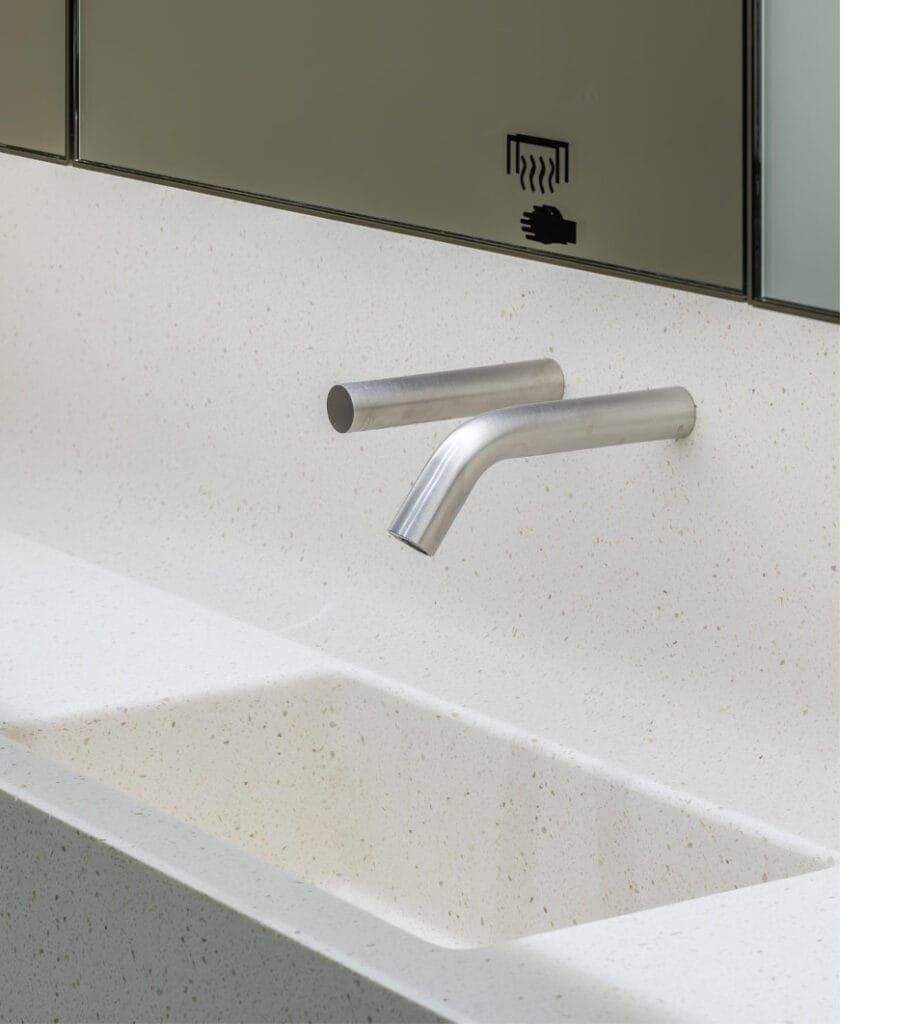 Panel mounted InForm soap dispenser saving space