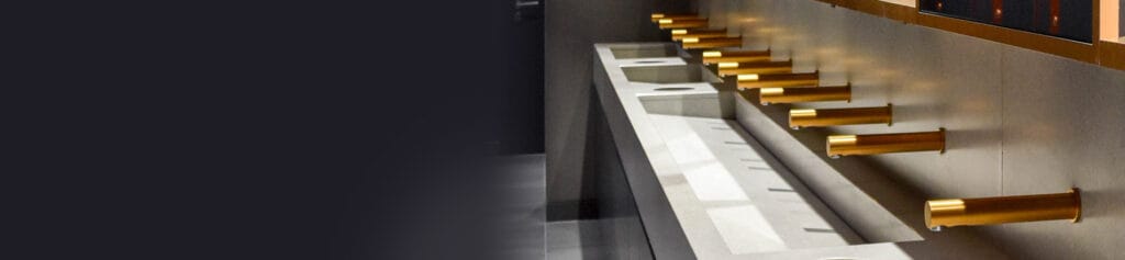 Row of commercial touch free taps