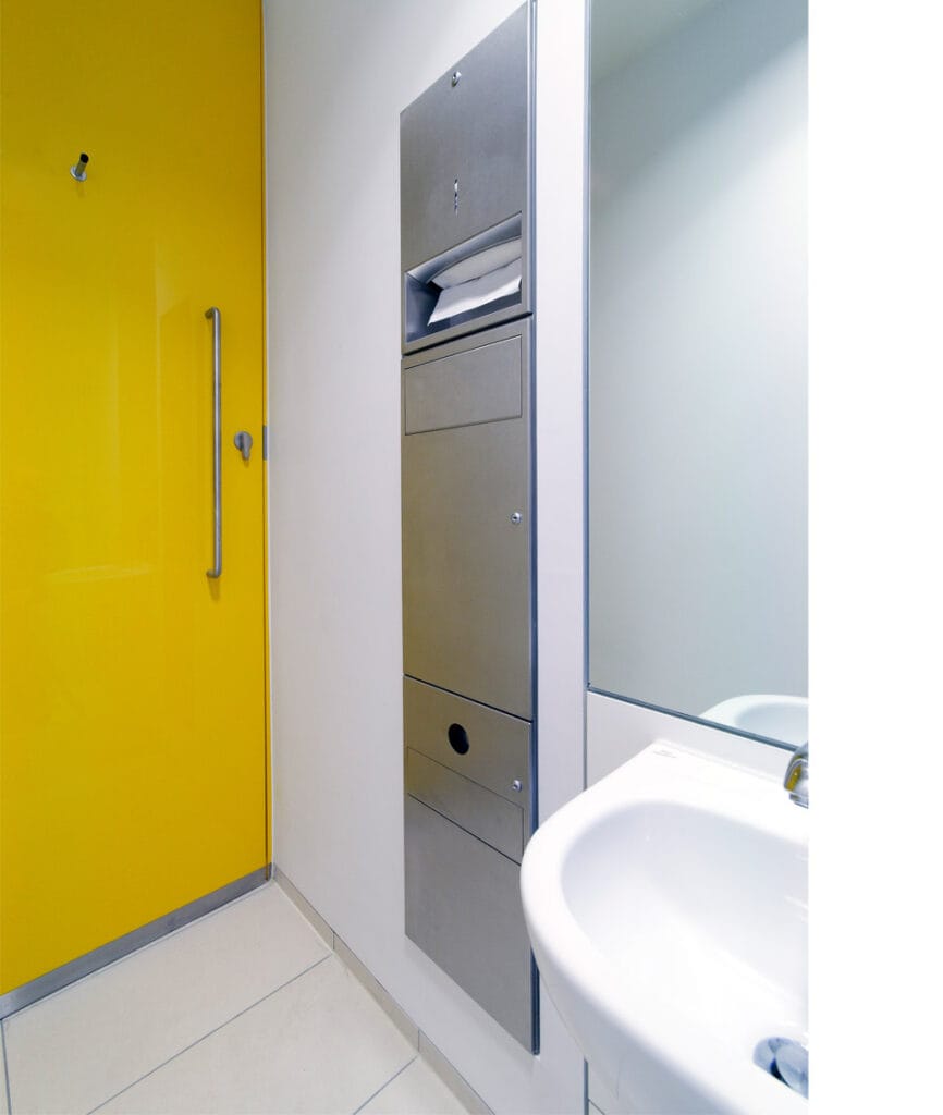 Recessed combination unit for a commercial washroom