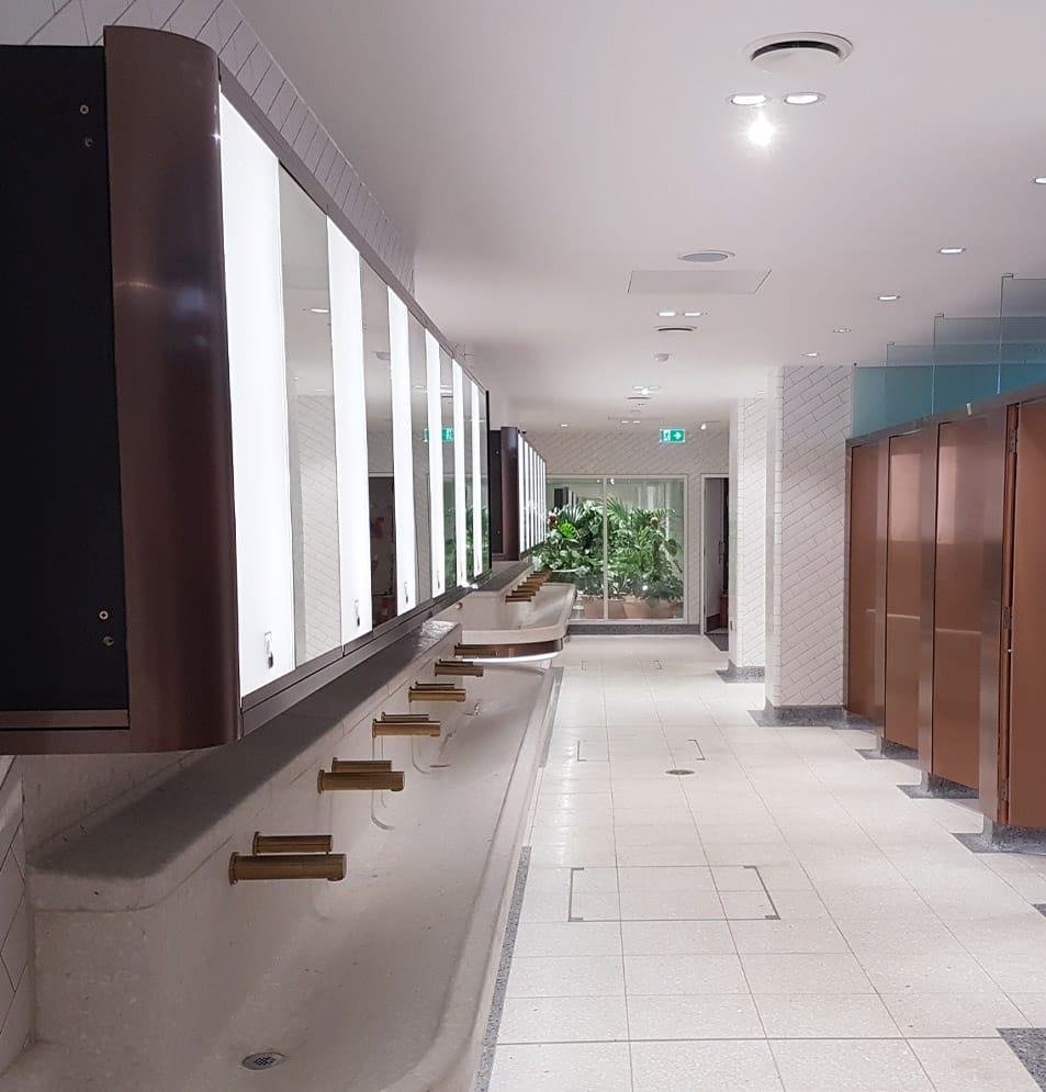 Shelf slab installed above commercial vanity tops