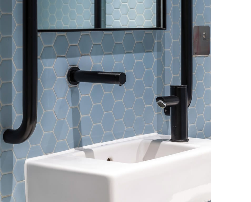 Wall mounted thru panel automatic soap dispenser in black special finish