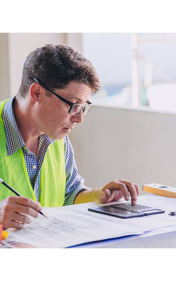 A person computing wall mounted tap installation service costs