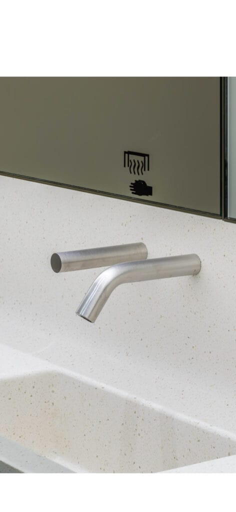 Wall plate mounted touch free tap and soap dispenser securely fixed with a wall plate