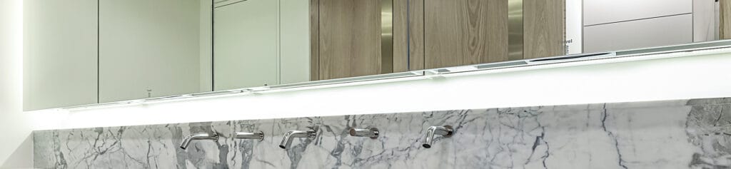 Traditional behind the mirror with touch free taps