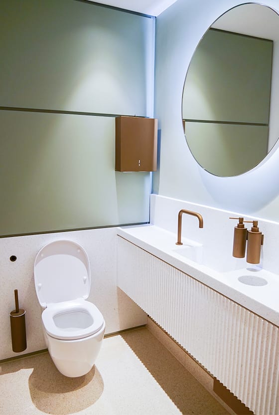 Special finished hand dryer, tap and dispensers in one of the washrooms at 8-10 Grosvenor Gardens