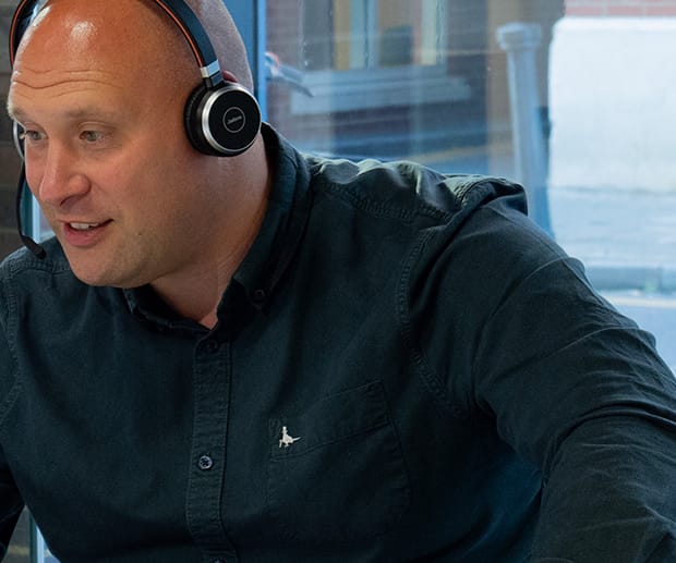 Dolphin Solutions washroom consultant speaking with a client