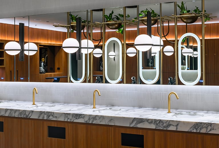 Special finished taps and pill mirrors at 20 Bond Street washroom