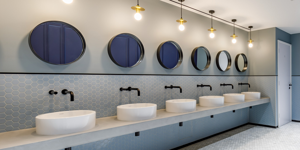 Handwashing Station with black taps and soap dispensers