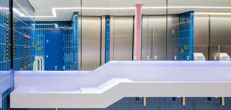 Dolphin WashWall System in a commercial washroom