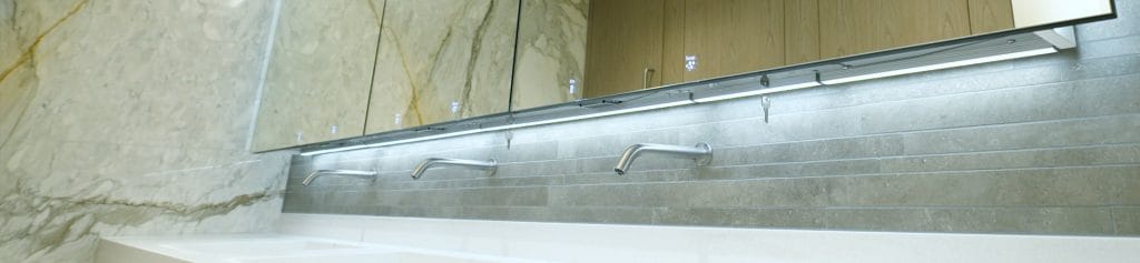 Alavo Behind Mirror System and Commercial Restroom Faucets