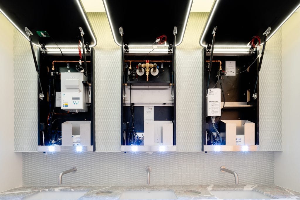 SMART restroom technology incorporated in WashWall Solo mirror system
